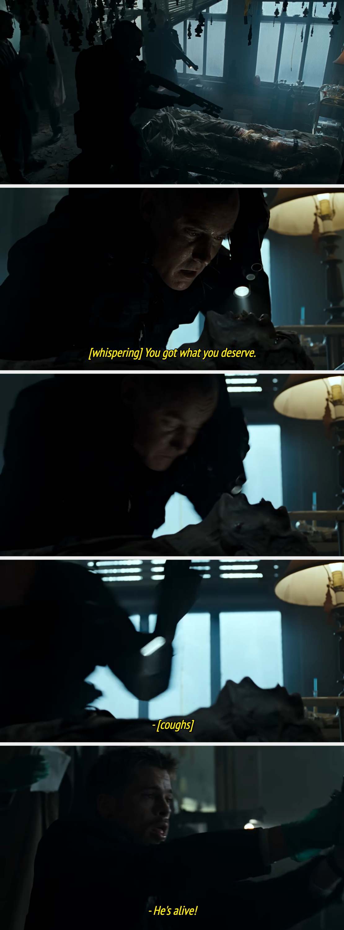 A man whispers "You got what you deserve" before inspecting another man, who then coughs and is declared alive