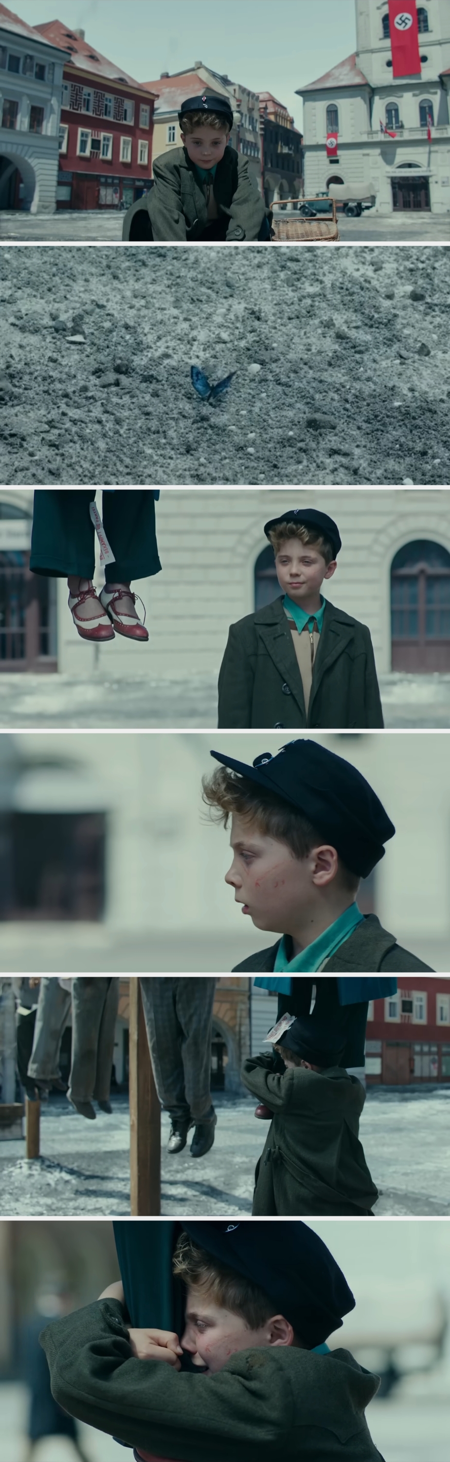 A young boy in vintage clothing stands in a historic European square, appearing emotional and contemplative