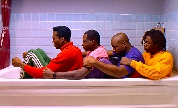 Four radical   successful  a bathtub, each   sitting successful  beforehand   of the other, recreating a bobsledding position; a country   from a drama  film