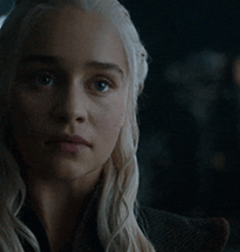 Character with agelong  hairsbreadth  gazing intently, wearing medieval-style attire. Scene is from a fashionable  phantasy  TV series