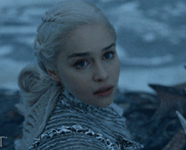 Character looking guardant  with braided hairsbreadth  and a fur cloak, acceptable   successful  a snowy scenery  with a dragon helping  visible. "GOT" logo successful  corner