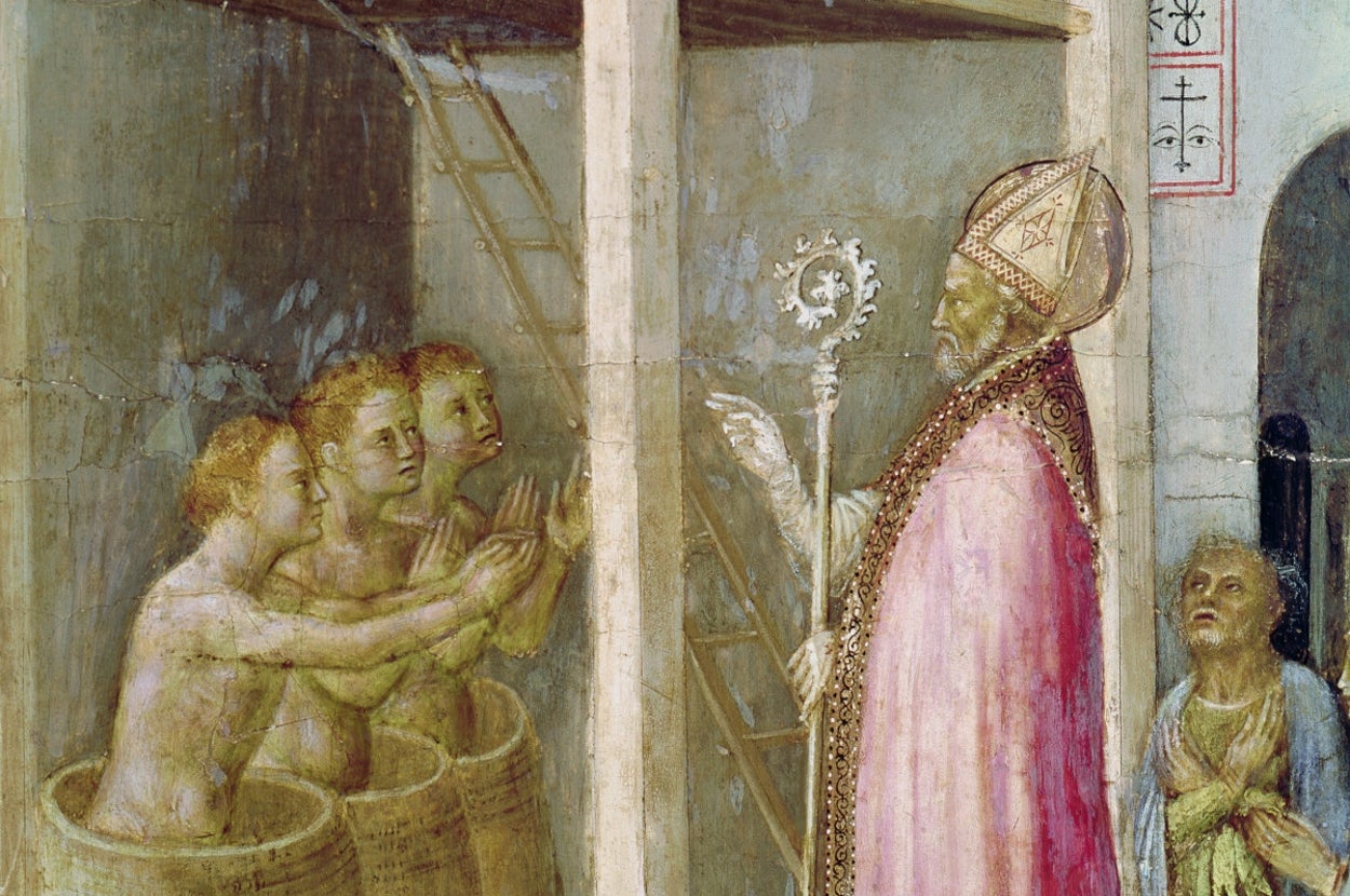 樽に投げ込まれた3人の子どもを蘇生させる聖ニコラウスを描いた1425年の絵画（Photo by Art Images via Getty Images）