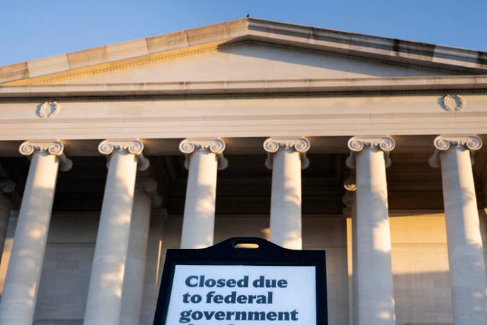 Government gathering  with a motion   reading, "Closed owed  to national  authorities  shutdown."