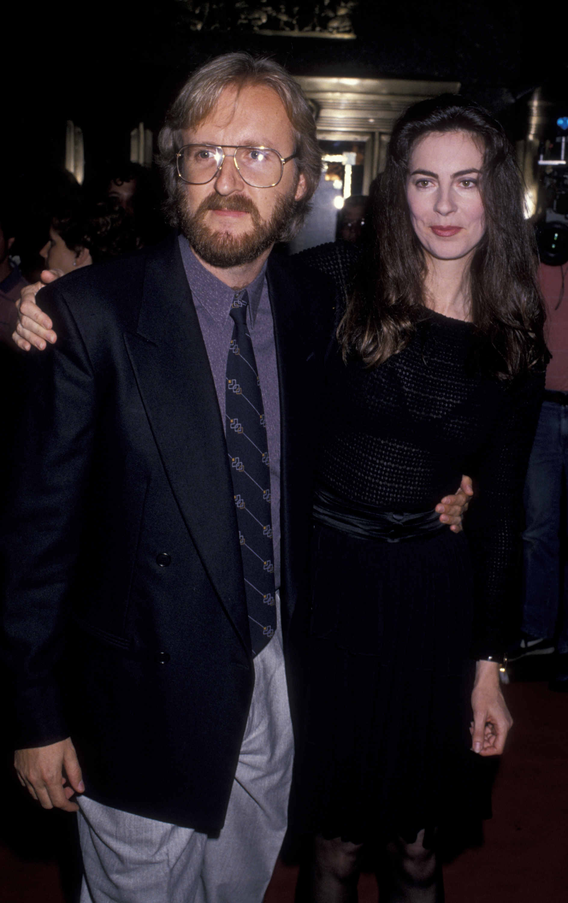 James Cameron and Kathryn Bigelow connected  a reddish  carpet. The antheral   is successful  a suit   with tie, and the pistillate   is successful  a sheer, long-sleeve dress. They airs  with arms astir   each   other
