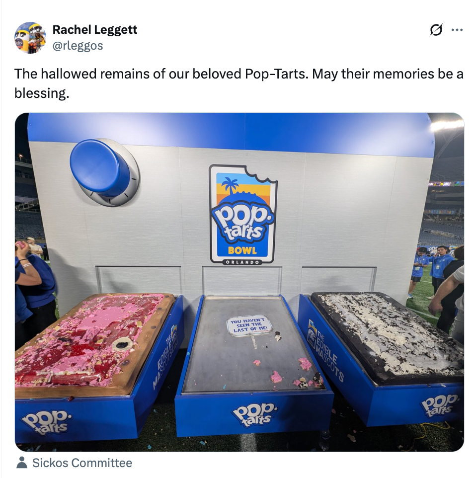 Three ample  Pop-Tarts displays with missing pieces connected  a stage, labeled "Pop-Tarts Bowl," suggesting they were consumed astatine  an event