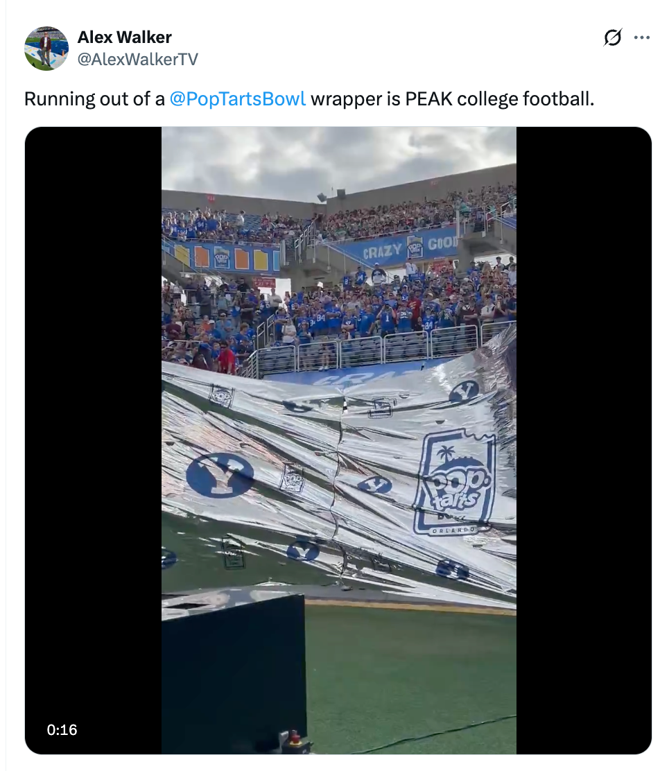Football crippled  assemblage  presumption    with ample  Pop-Tarts branded banner being unfurled successful  the stands