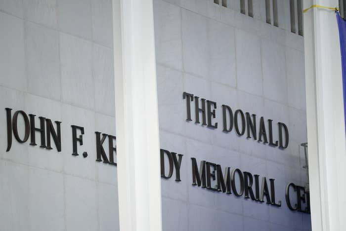 Text on a wall reads "The Donald John F. Kennedy Memorial Center."