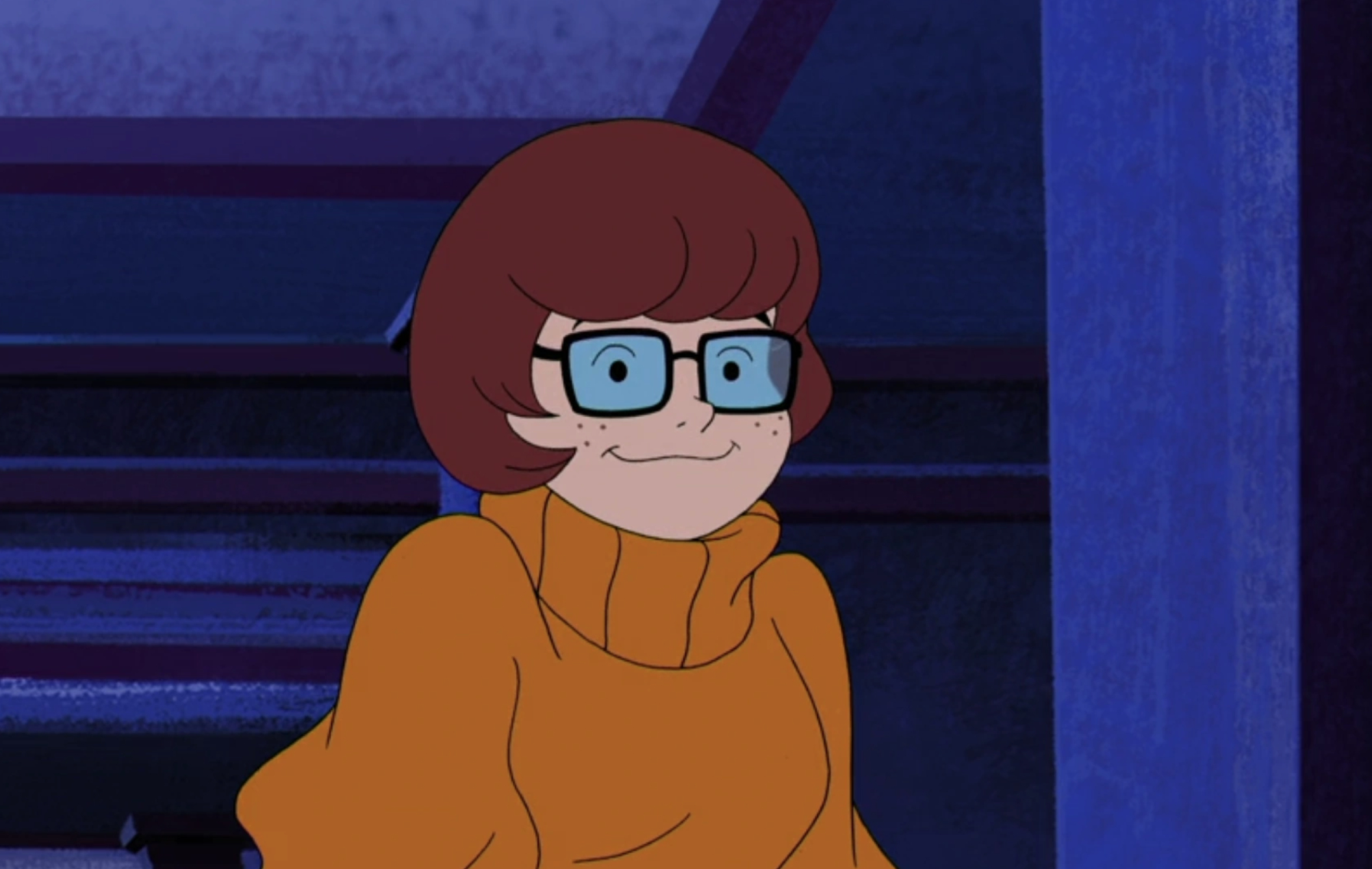 Velma smiling.