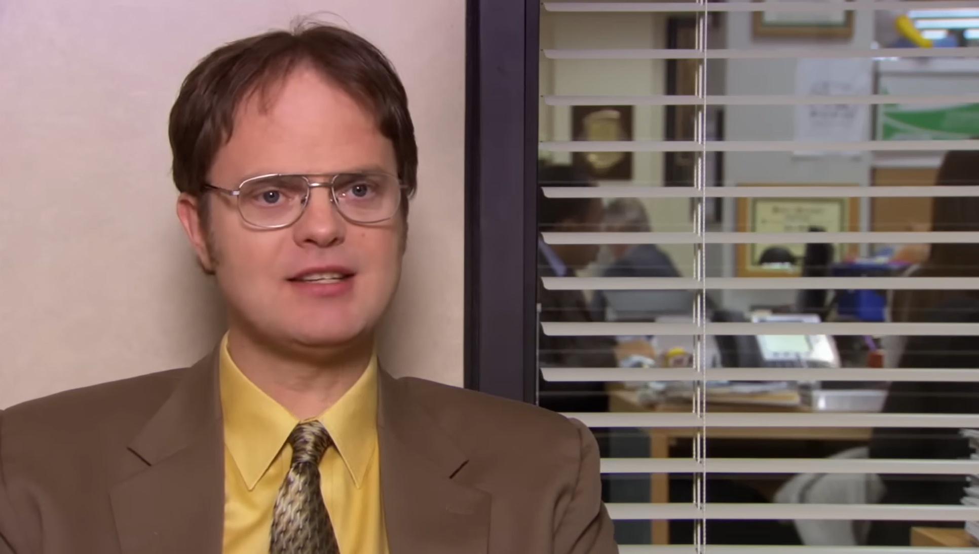 Dwight speaks to the camera. 