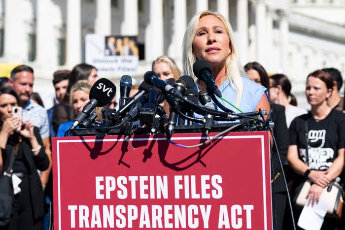 marjorie taylor greene speaks astatine  a podium surrounded by microphones during a property   lawsuit   for the Epstein Files Transparency Act