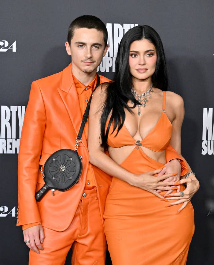 Timothee Chalamet and Kylie Jenner successful  coordinated orangish  outfits airs  unneurotic  astatine  an event. The pistillate   wears a formal  with cutouts and a connection    necklace