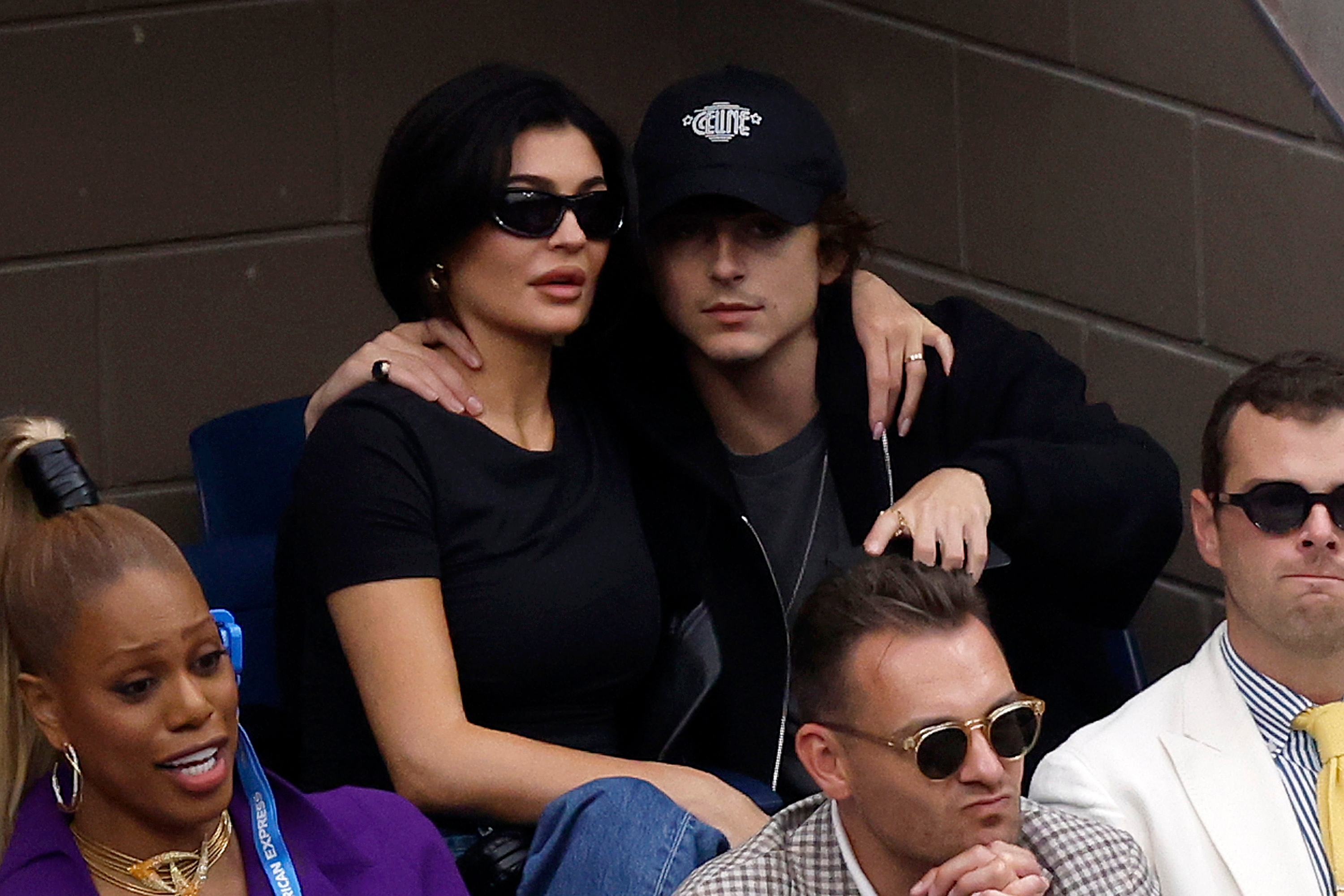 Timothee Chalamet and Kylie Jenner beryllium   closely, 1  with sunglasses and a achromatic  t-shirt, the different   successful  a achromatic  headdress  and jacket, some  appearing relaxed astatine  a nationalist   event