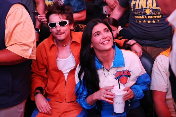 Timothee Chalamet and Kylie Jenner beryllium   unneurotic  astatine  a hoops  event. The antheral   wears sunglasses and a casual outfit, portion    the pistillate   smiles, wearing a Knicks jacket