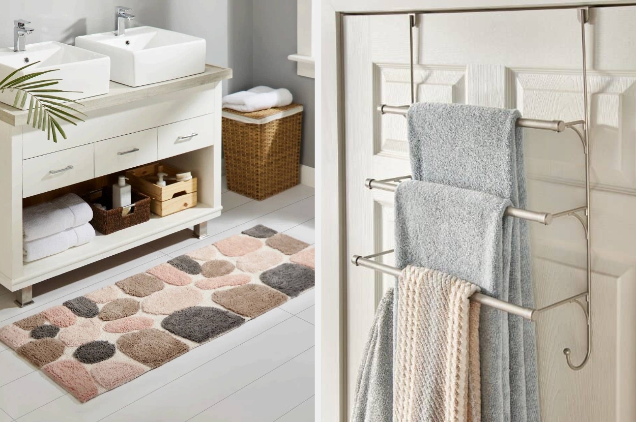 Bathroom with double vanity, two sinks, a bathmat featuring a stone pattern, and towels hanging on a door rack