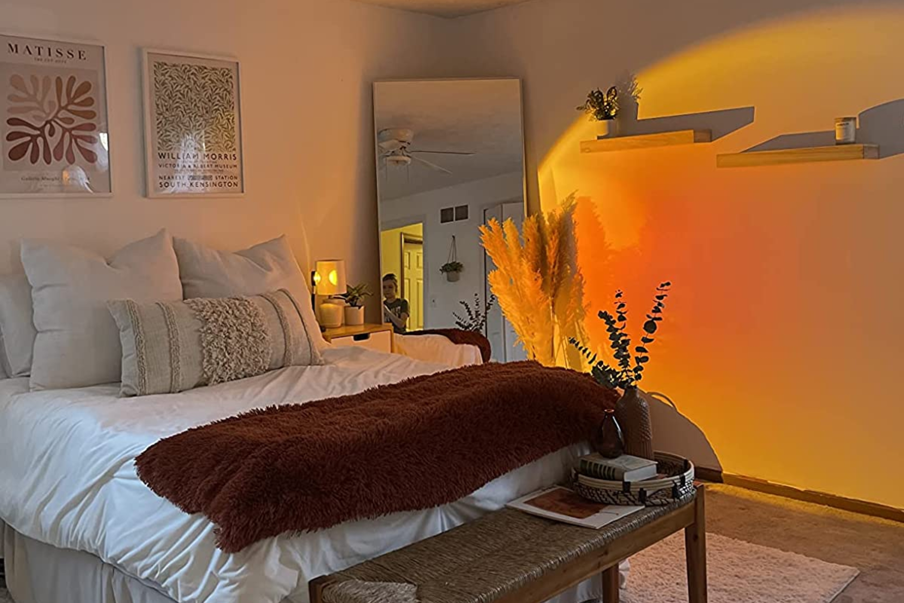 the orange light concentrated on a bedroom wall