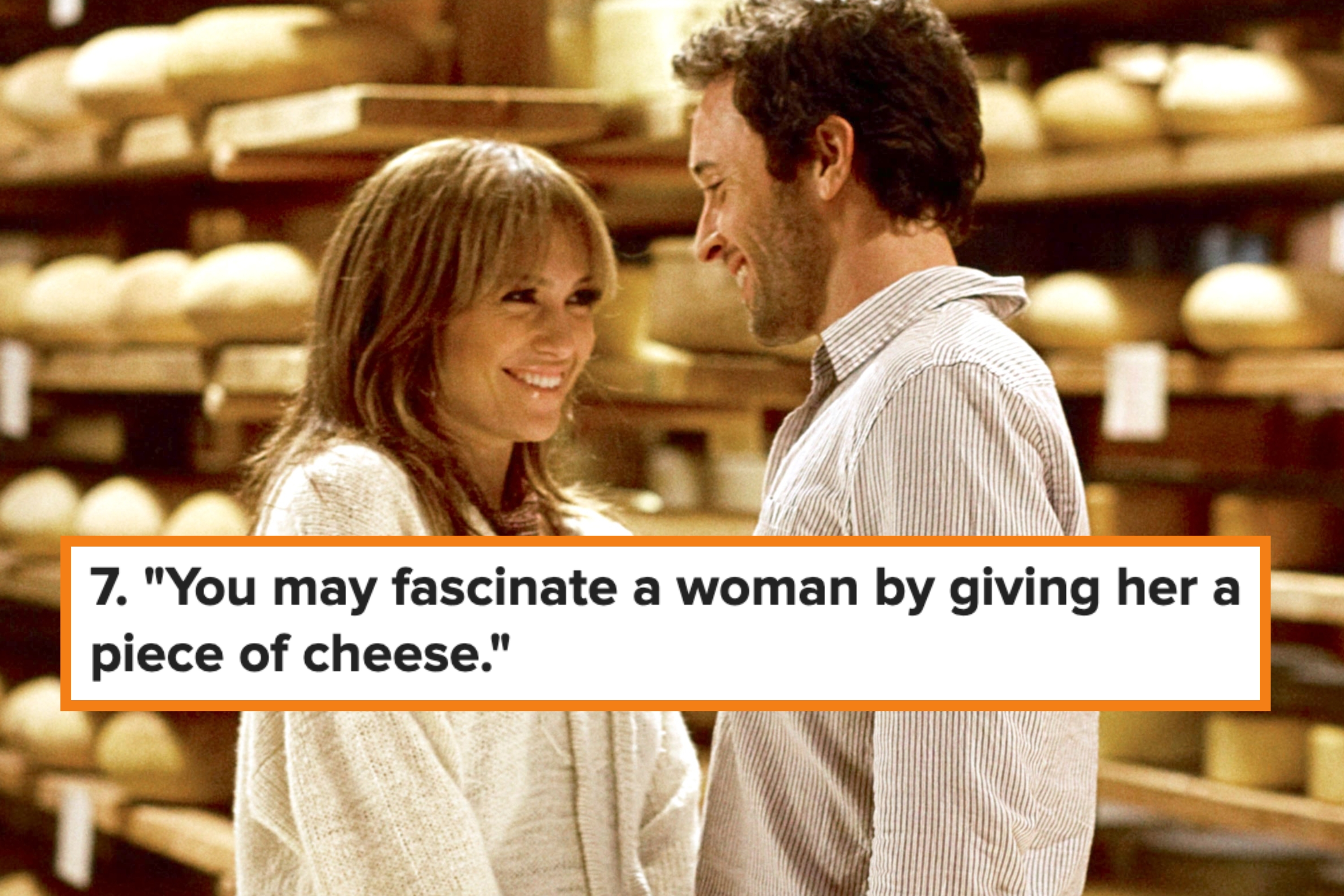 Two people smiling at each other in a cozy setting with shelves of bread in the background