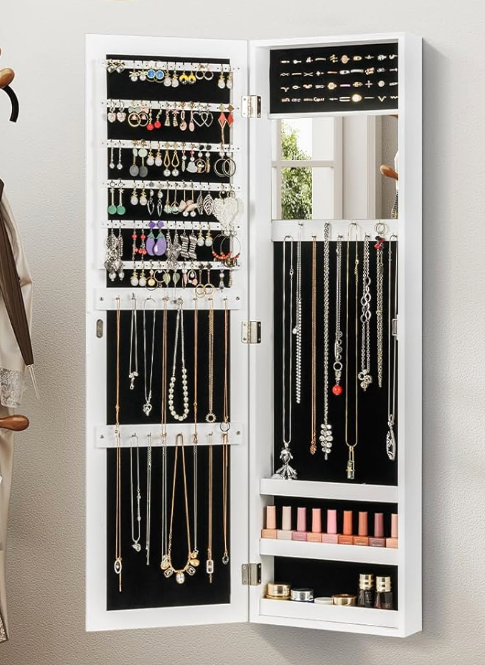 An unfastened  jewelry furniture  displays assorted  earrings, necklaces, rings, and rows of lipstick, neatly organized