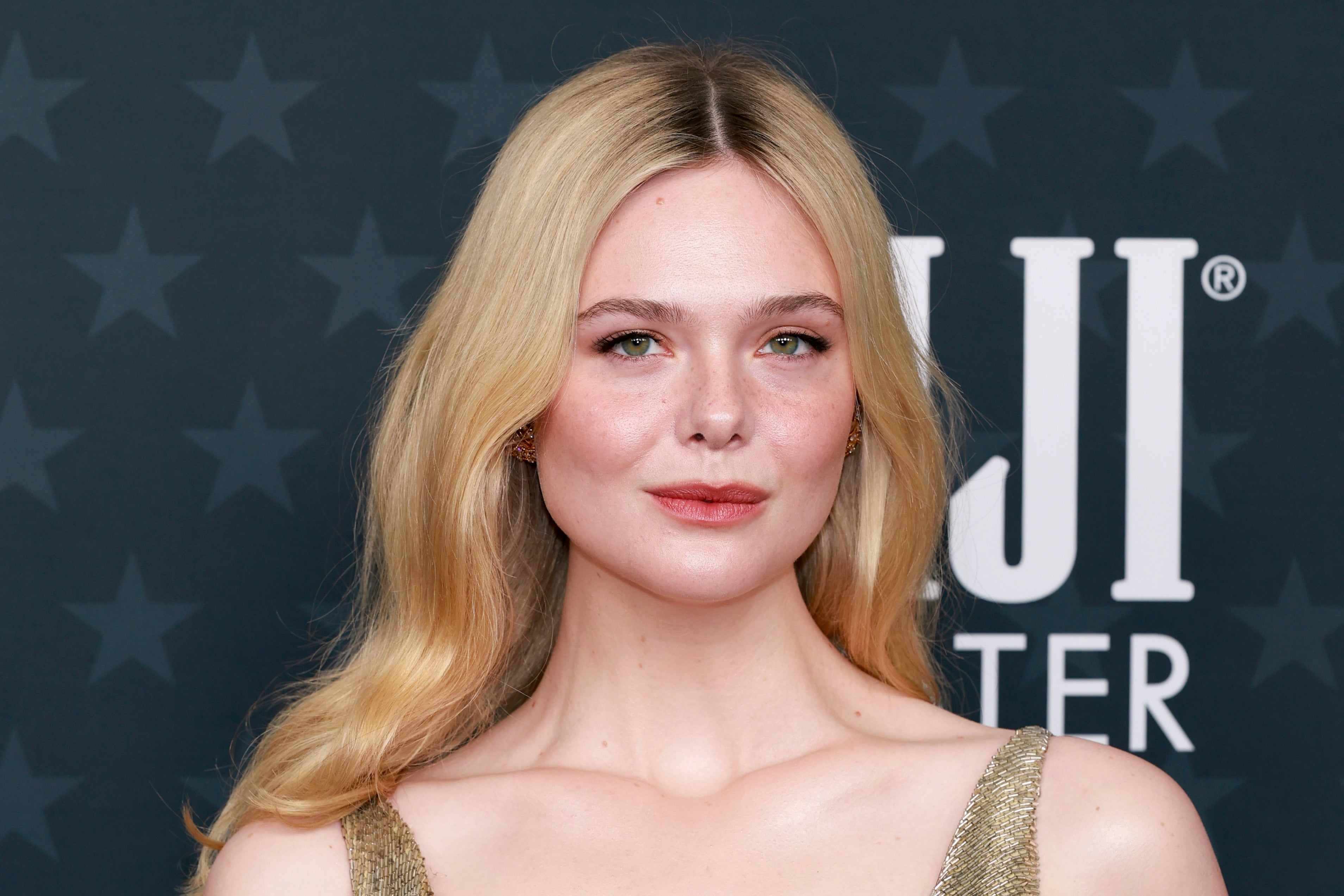 Elle Fanning Recalled The Time Colin Firth “Rushed” To Help Her After She Fainted At A Cannes Dinner Because Her Dress Was “Too Tight”