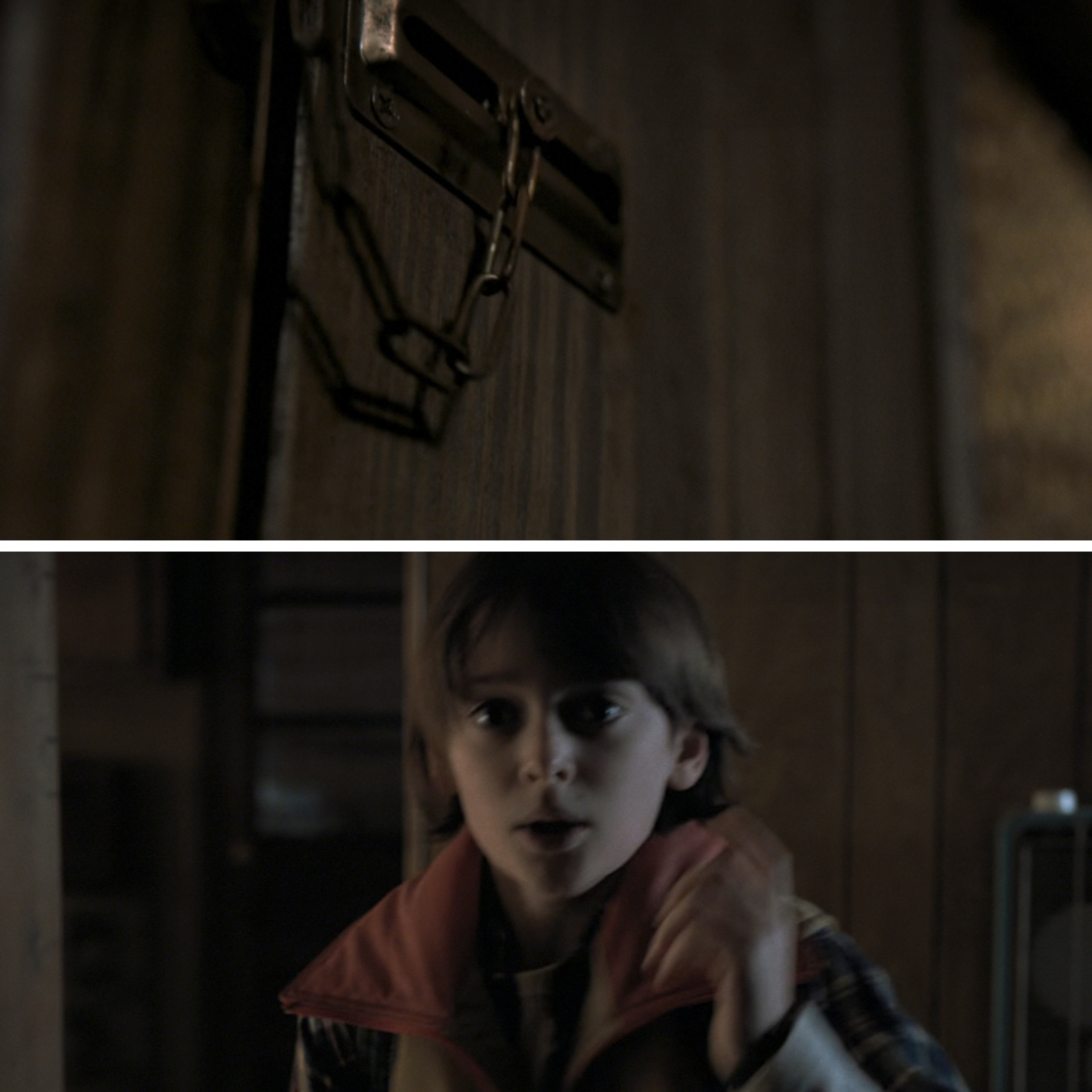 A close-up of a chain lock on a door above a concerned child inside a dimly lit room, wearing a jacket with a popped collar