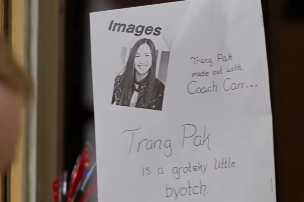 A photo of a note with a black-and-white image of a woman. The note accuses her of inappropriate behavior with a coach, with offensive language used