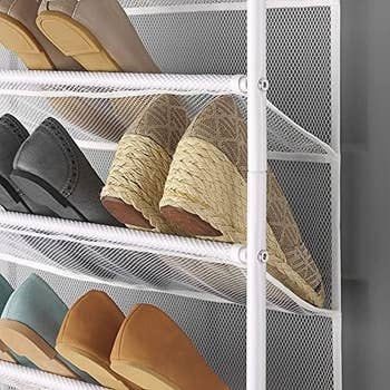 Shoes organized connected a mesh rack showing assorted styles, including wedges and loafers, highlighting location retention solutions