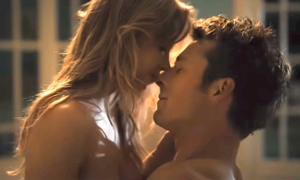 Couple embracing intimately, with closed eyes and gentle smiles, highlighting a tender romantic moment