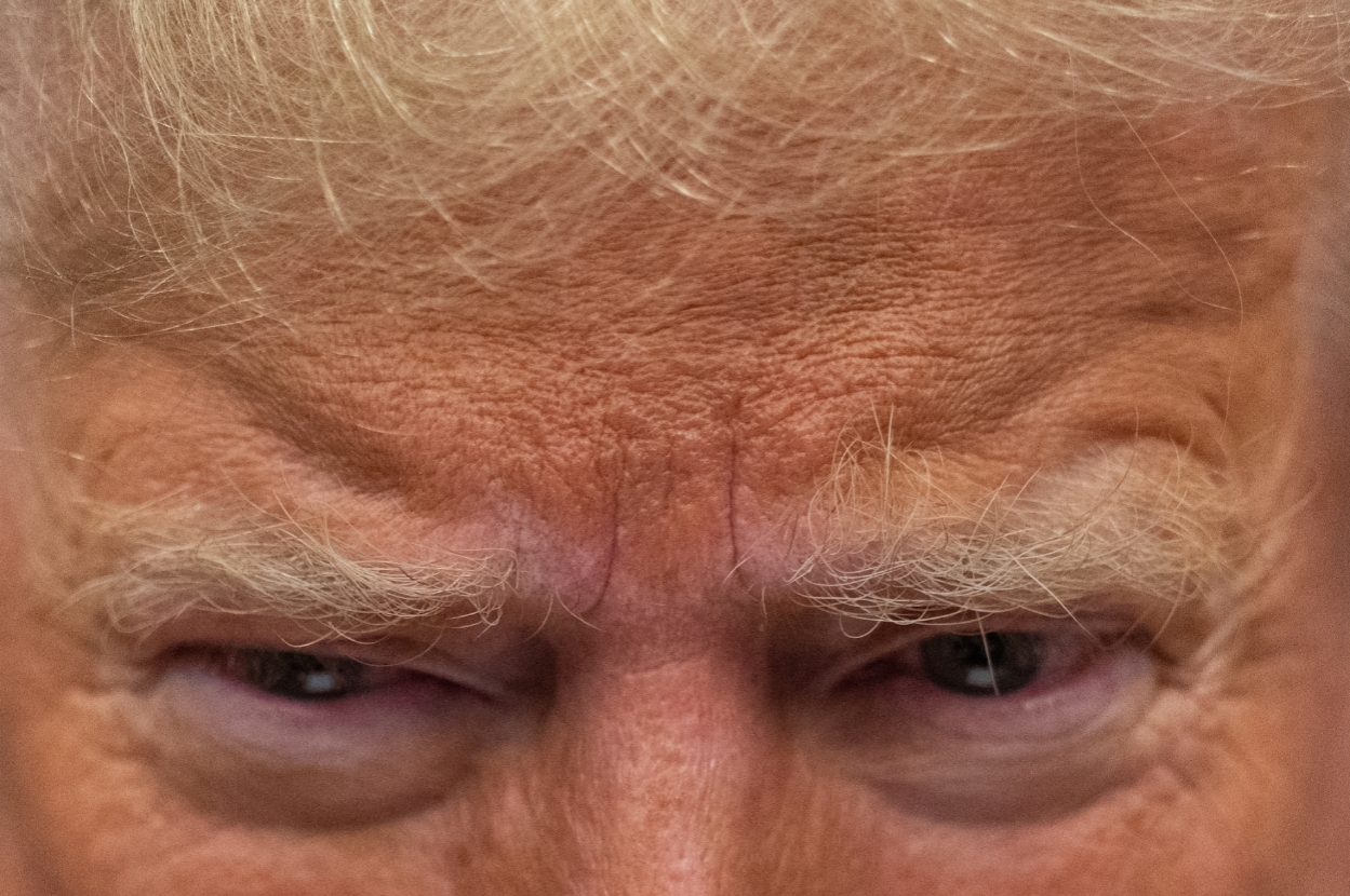 Close-up of a person's face showing furrowed brows and intense expression