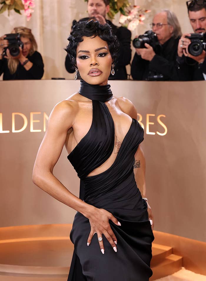 man dressed as woman at golden globes Man in Green Dress at Golden Globes