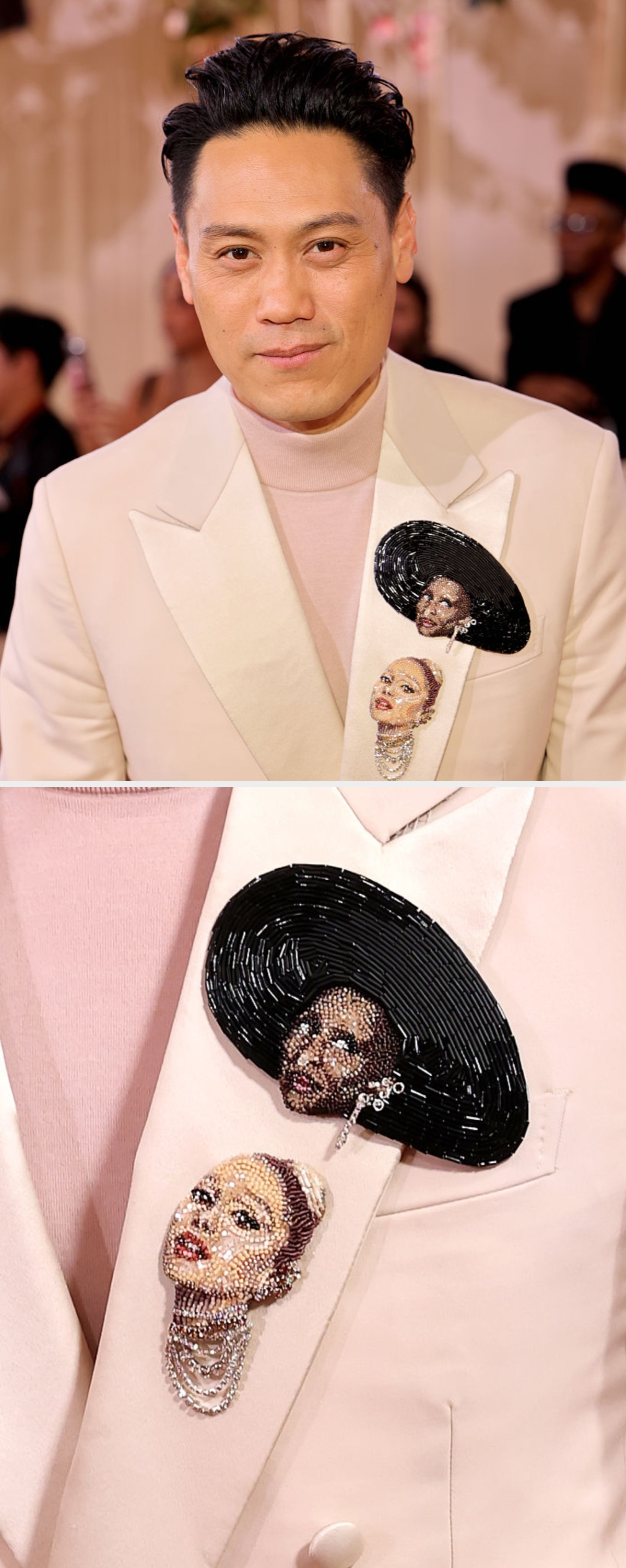 Close-up of a pinkish blazer with intricate beaded brooches depicting 2 faces, 1 wearing an elaborate hat, enhancing the outfit's elegance