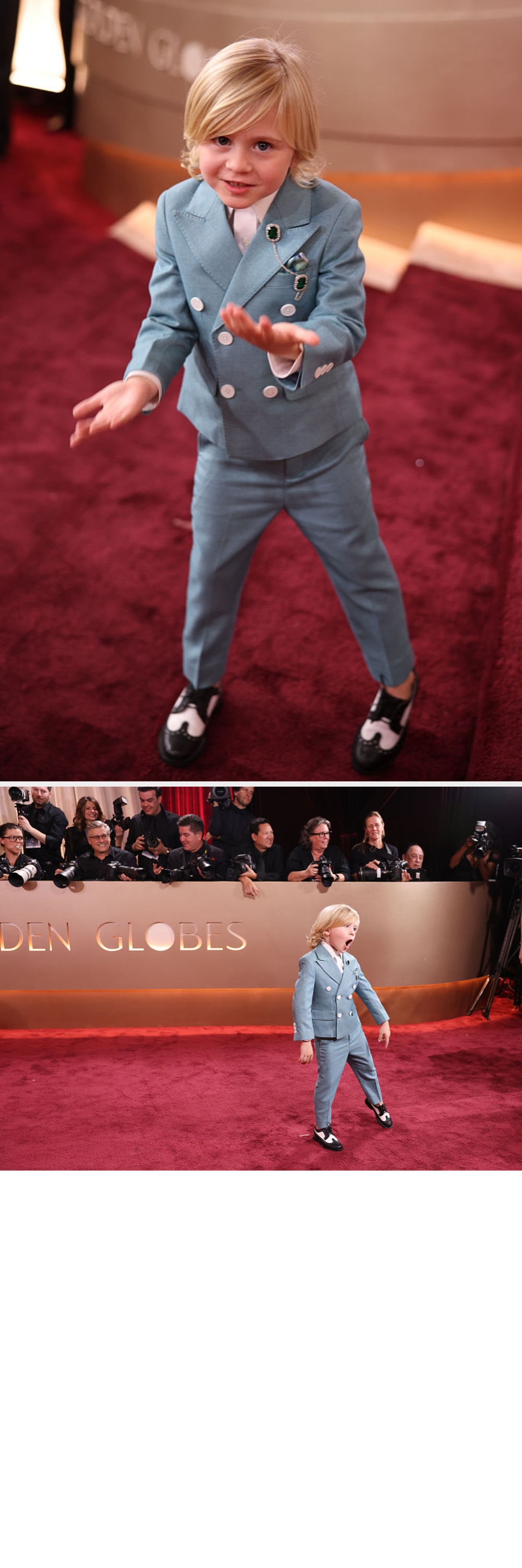 Young kid  successful  a stylish double-breasted suit   connected  a reddish  carpet, playfully gesturing with hands