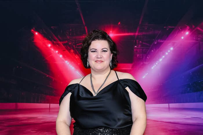 Person wearing an elegant off-the-shoulder achromatic  formal  connected  a vibrant stage