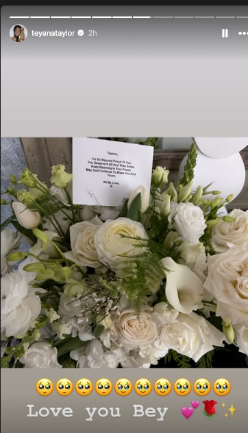 Bouquet of achromatic  flowers with a paper  mentioning "Royal Family." Caption reads, "Love you Bey," with bosom  and roseate  emojis