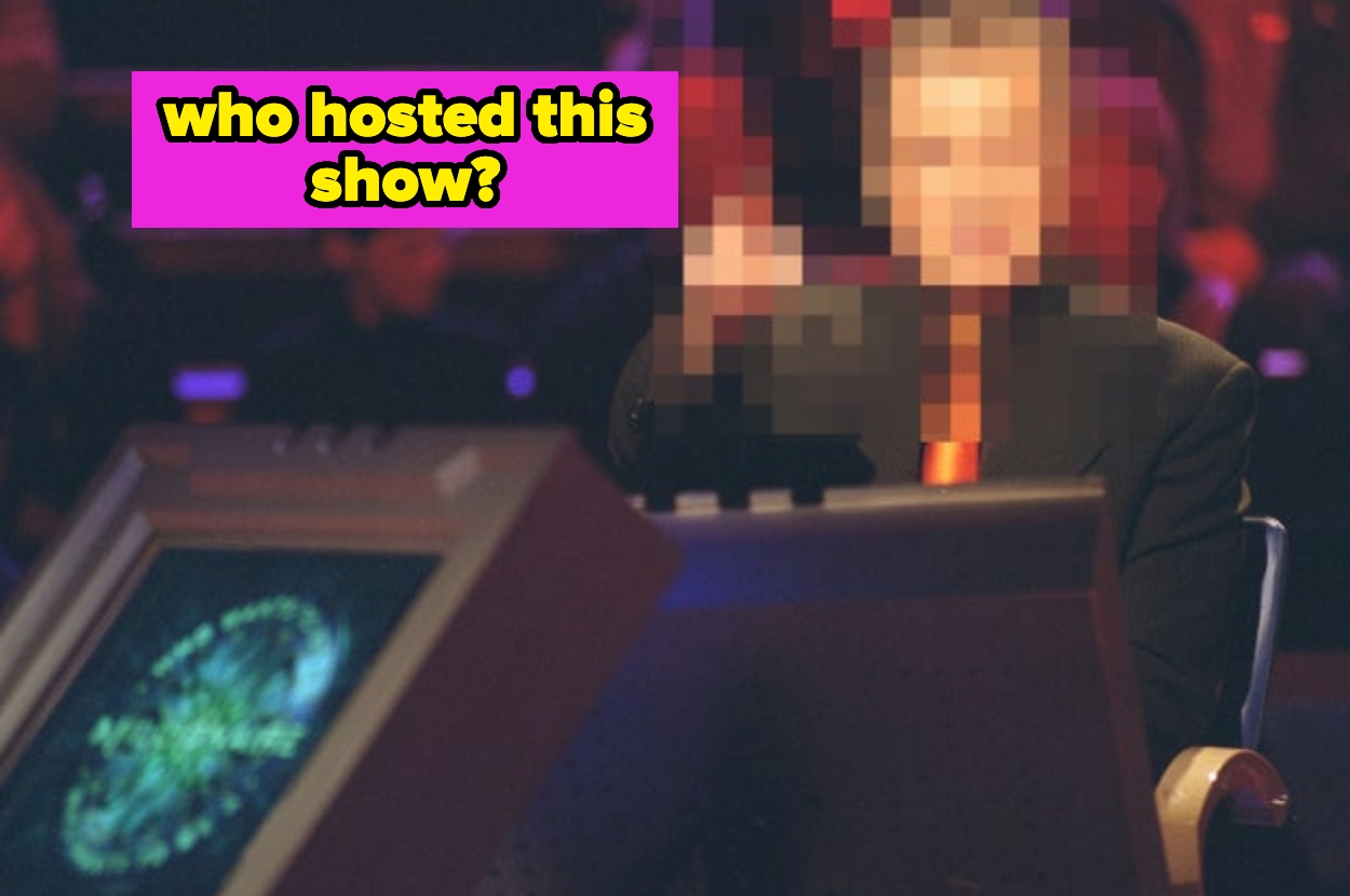 A person sits in front of a screen displaying a quiz show interface. Text asks, "Who hosted this show?"