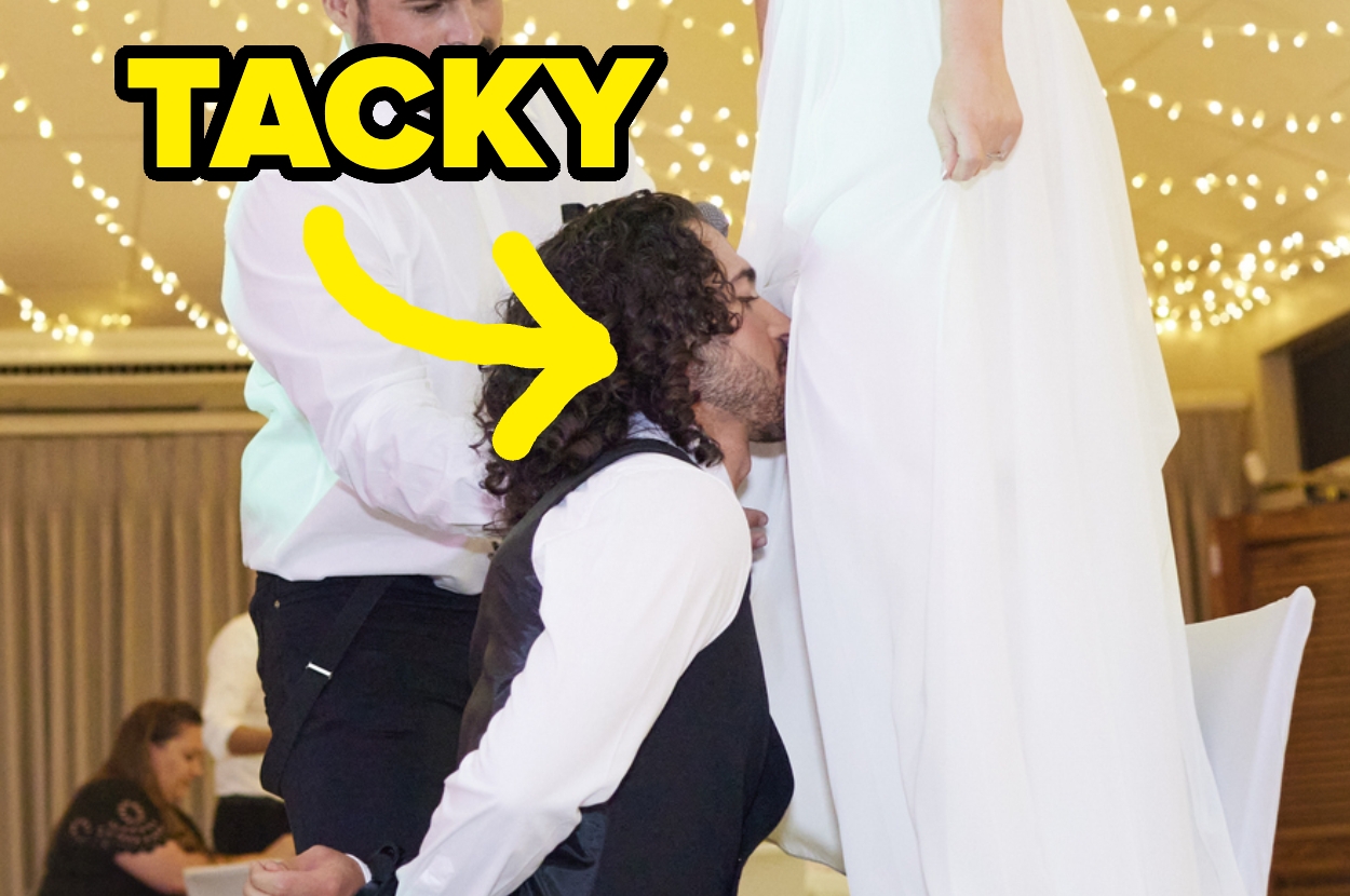 A man in formal attire removes a garter from a bride's leg during a wedding reception, with "Tacky" written above