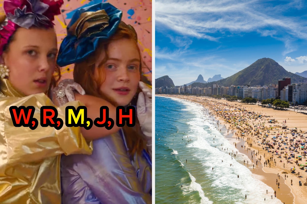 Two people in shiny, futuristic costumes look at the camera on the left; a busy beach with people and mountains in the background on the right