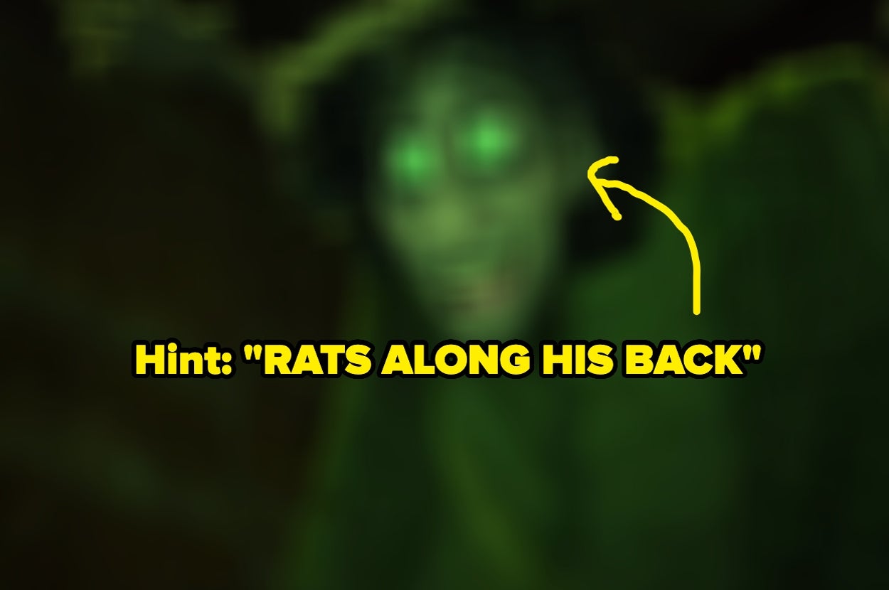 Blurry image with text: "Hint: 'RATS ALONG HIS BACK'" in bold letters. An arrow points to the face of a character