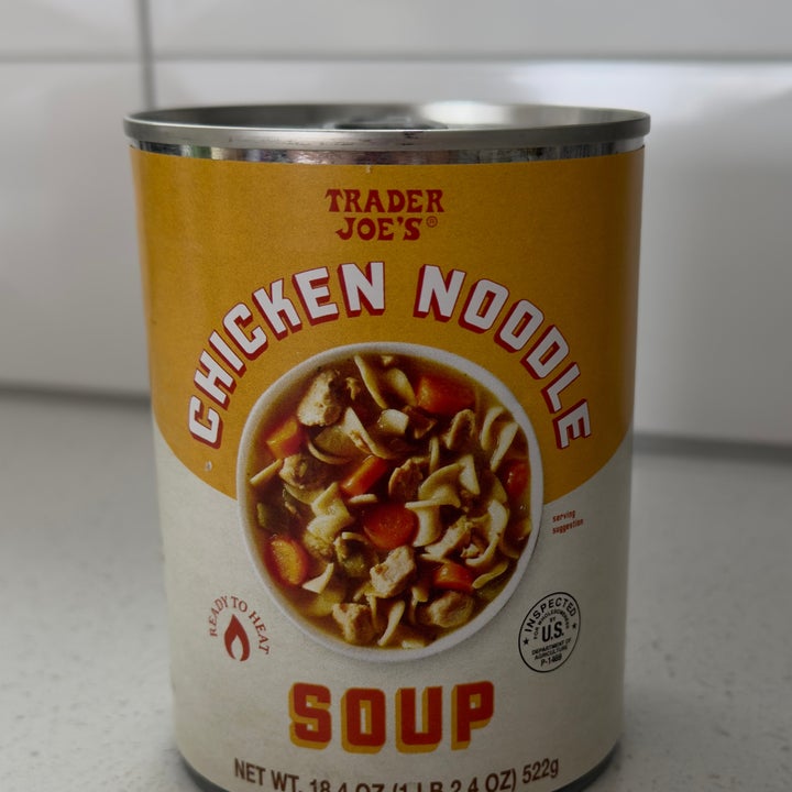 Trader Joe's chicken noodle soup can on a kitchen counter with visible label details