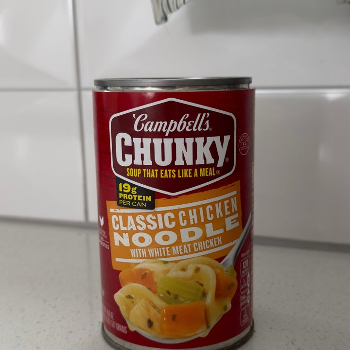 Campbell's Chunky Classic Chicken Noodle Soup can on a kitchen counter