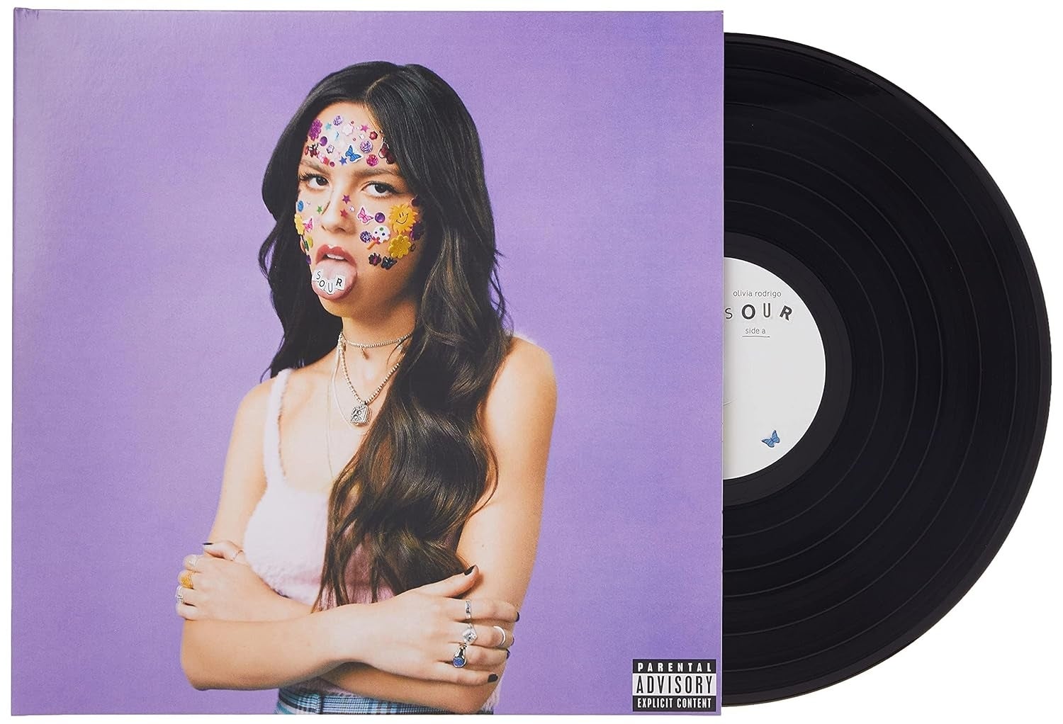Young pistillate   with decorated look   poses cross-armed adjacent  to vinyl grounds   connected  a purple backdrop