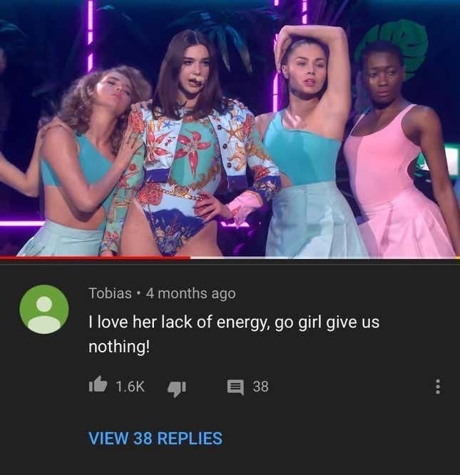 Performer connected  signifier    with backup dancers; a remark  beneath  humorously praises her debased  energy