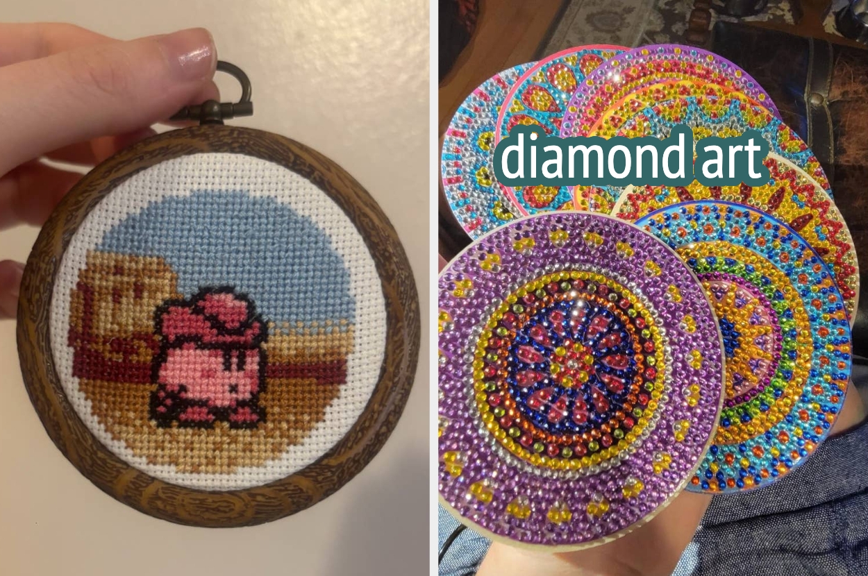 Hand holding a round cross-stitch of a pixel character; other hand holds colorful diamond art mandalas, showcasing craft shopping options