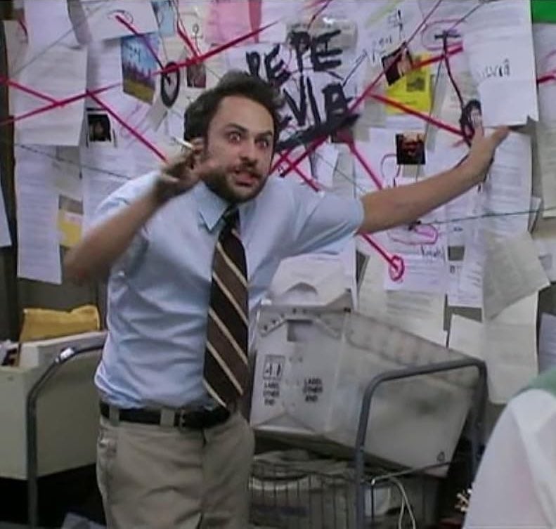 Person gesturing astatine  a chaotic partition  filled with papers and reddish  string, conveying a conspiracy mentation   oregon  probe  scenario