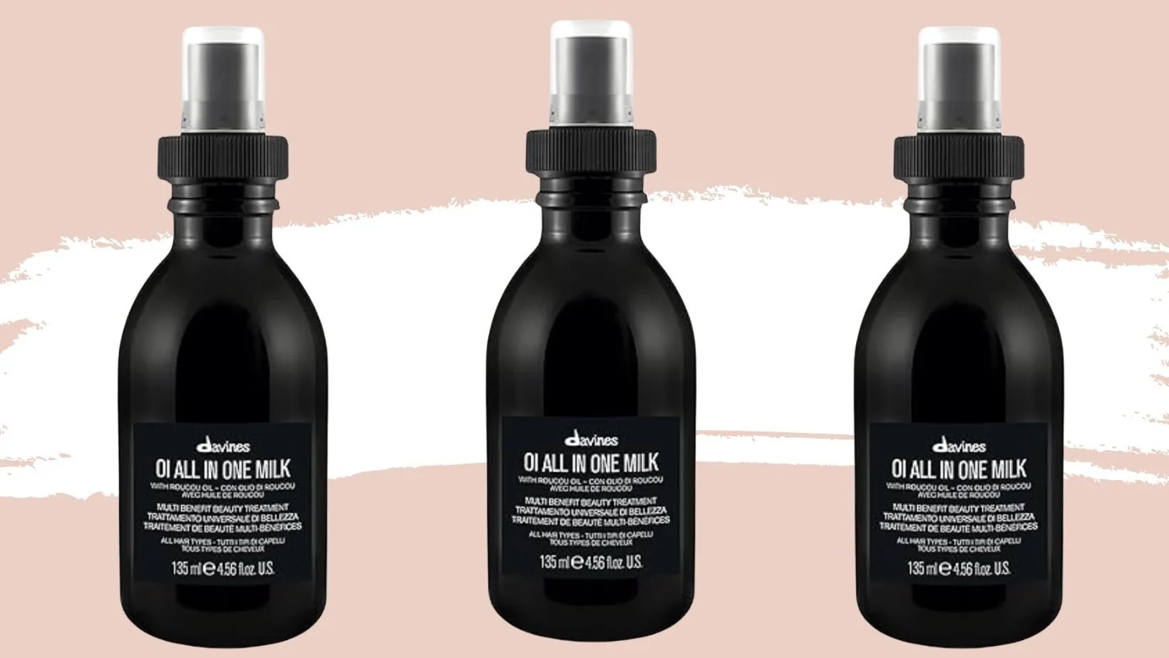 Three bottles of Davines OI All in One Milk hair treatment spray