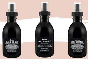 Three bottles of Davines OI All in One Milk hair treatment spray