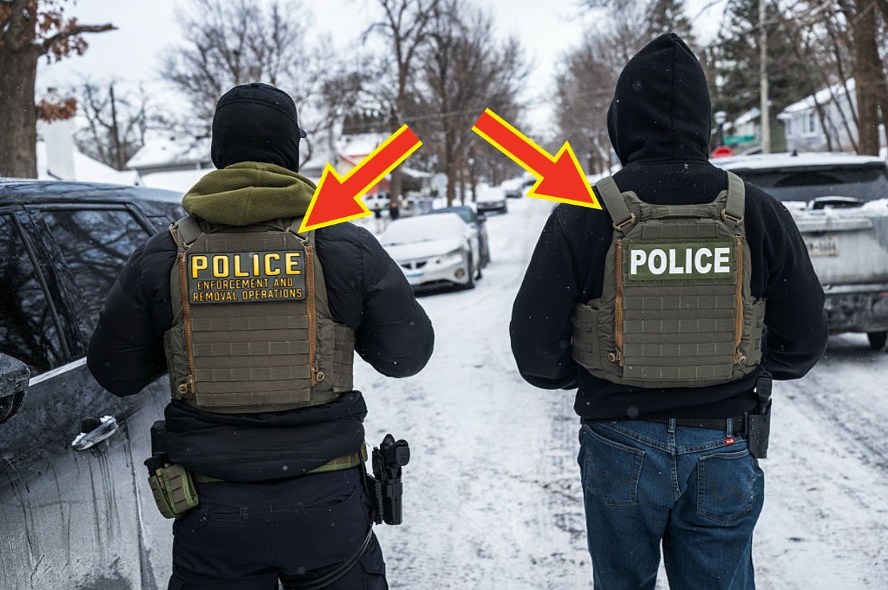 Two law enforcement officers in tactical gear labeled "Police" walking on a snowy street