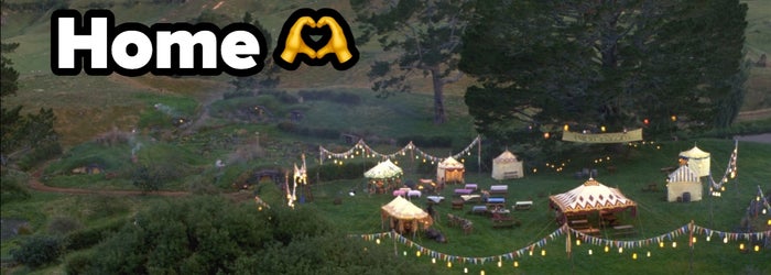 Scenic garden landscape with festive tents and string lights, a large tree, and a rainbow in the background. Word "Home" is written in bold