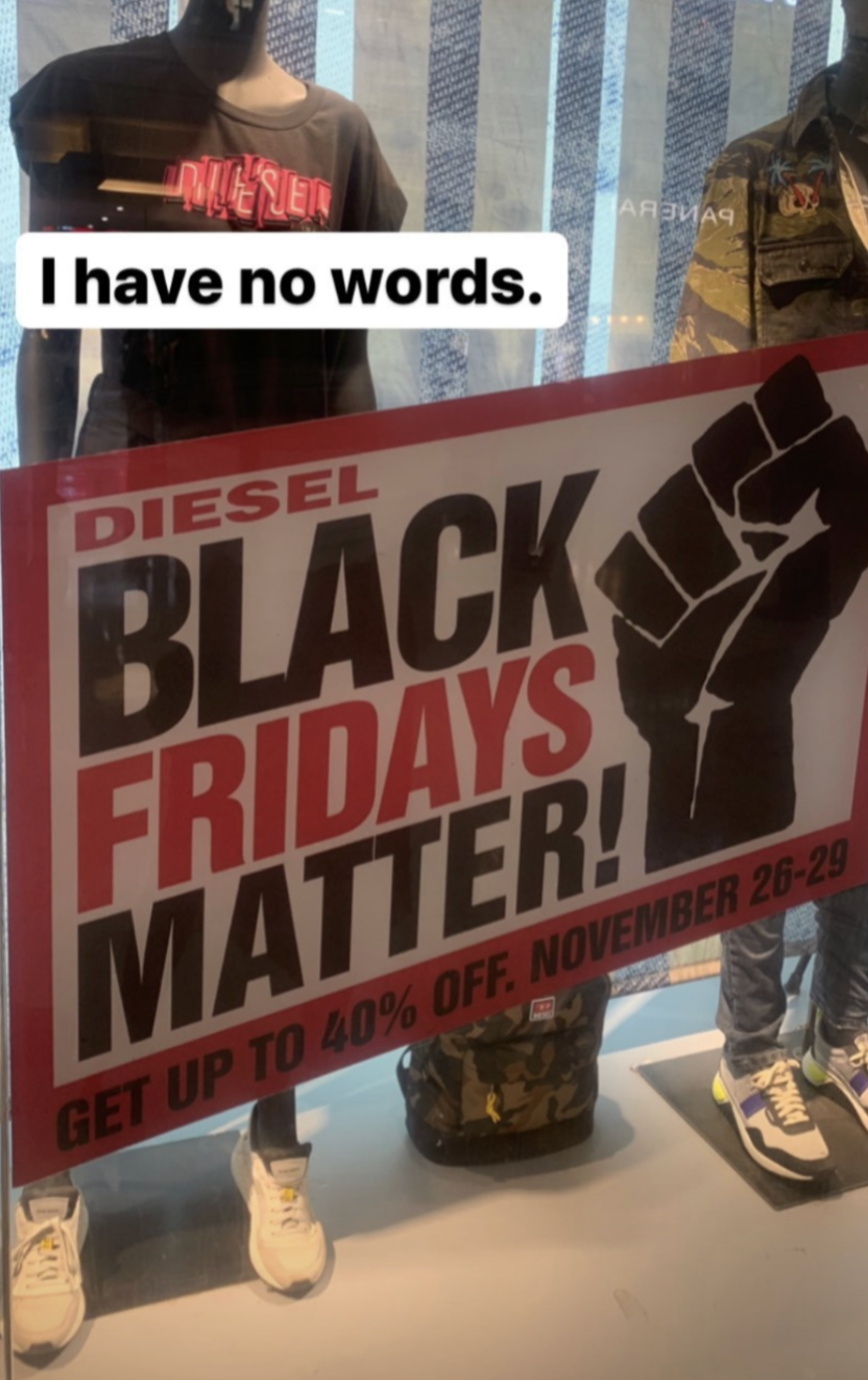 Store window display with "BLACK FRIDAYS MATTER! Get up to 40% off, November 26-29" sign and mannequin in camo pants. Text overlay: "I have no words."