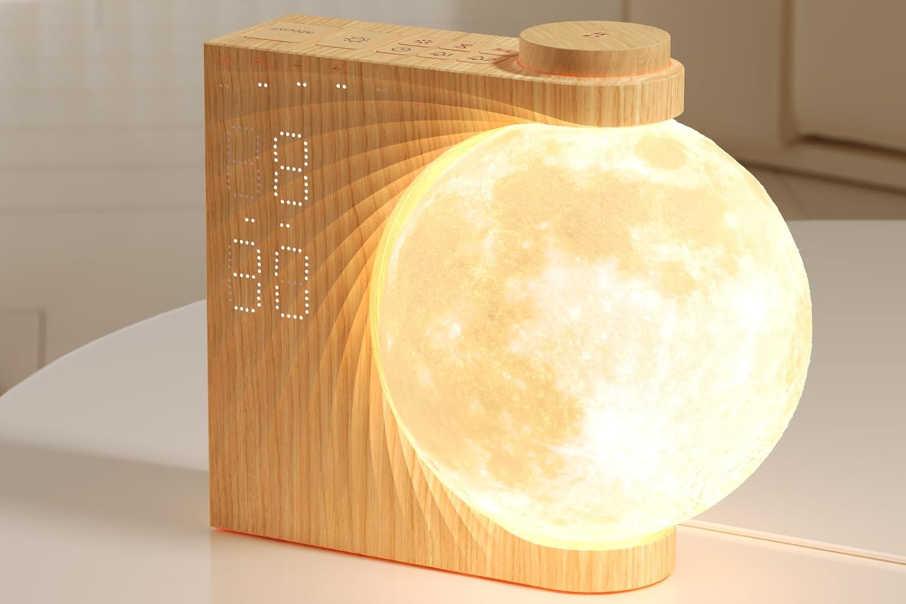 Wooden clock with glowing moon lamp on table, featuring LED display and minimalist design
