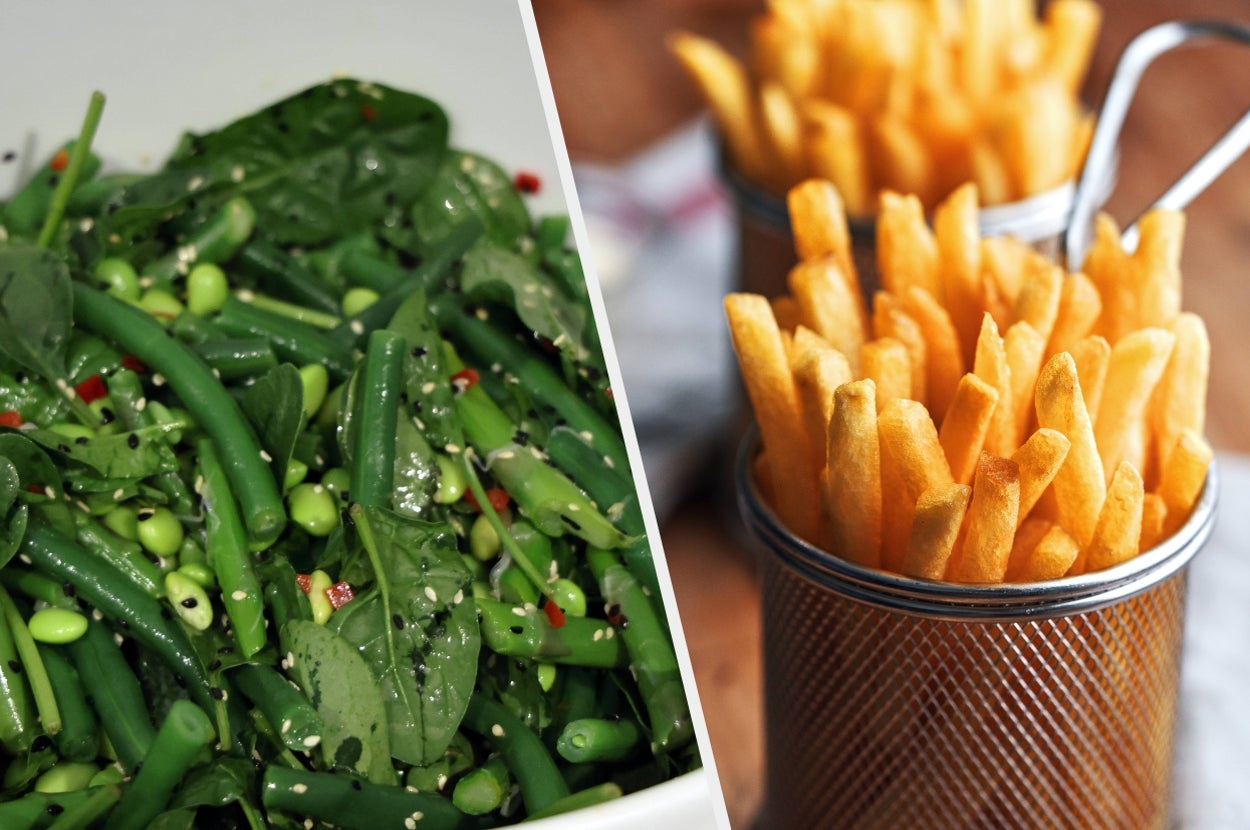 Salad with greens and seeds alongside fries in metal cups, showcasing a choice between a healthy and indulgent snack