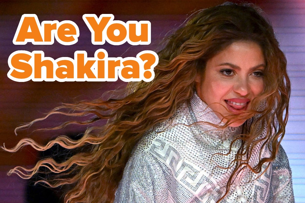 A woman with long, wavy hair and a patterned outfit smiling with text reading "Are You Shakira?"